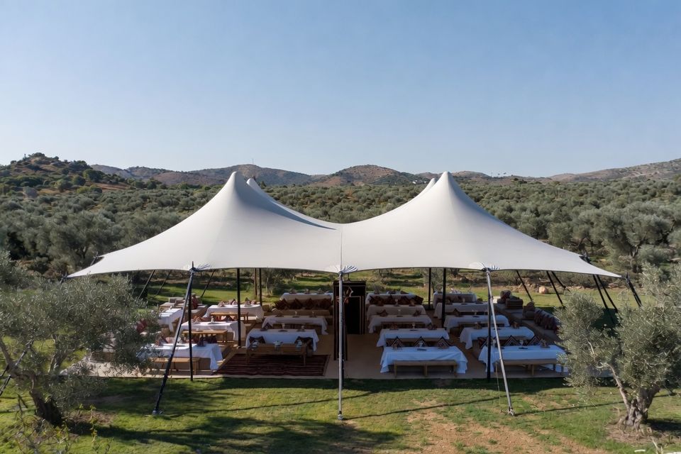 Bedouin stretch tent integrated into a natural event setting