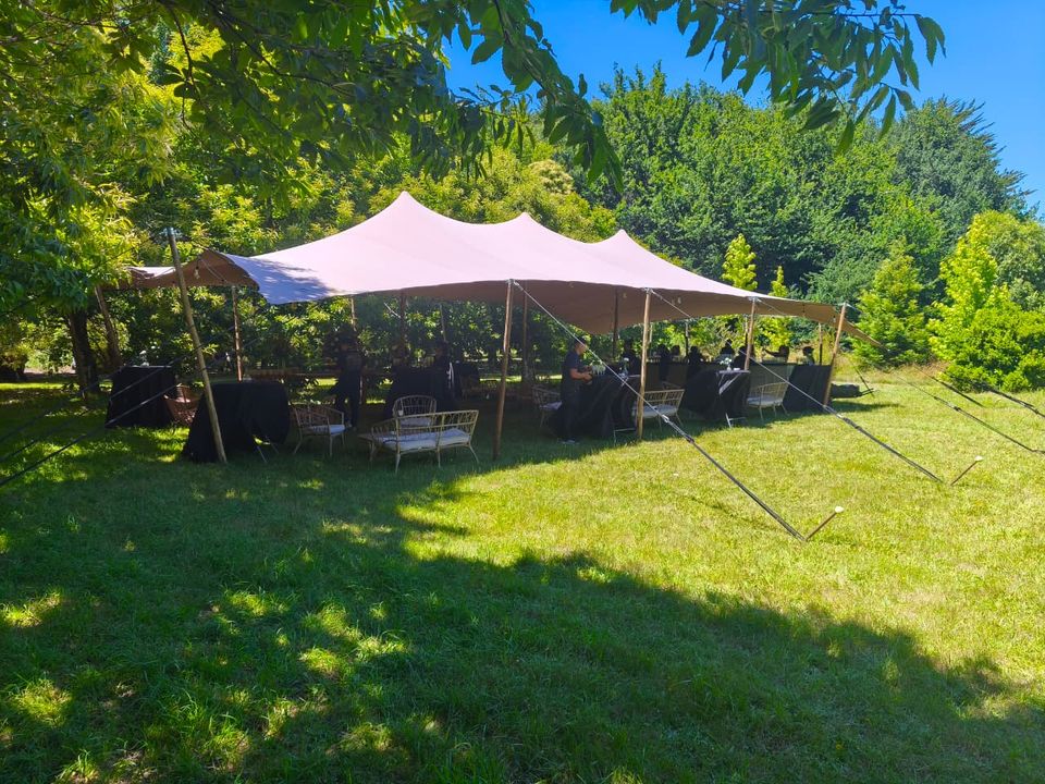 Garden social event beneath a Bedouin stretch tent